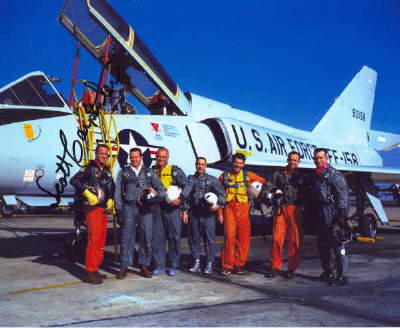 The Mercury 7 in flight gear, Signed by Scott Carpenter