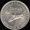 Skylab Coin containing flown metal